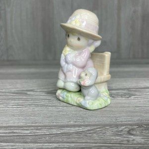 Precious moments puzzle salt and pepper shaker on bench